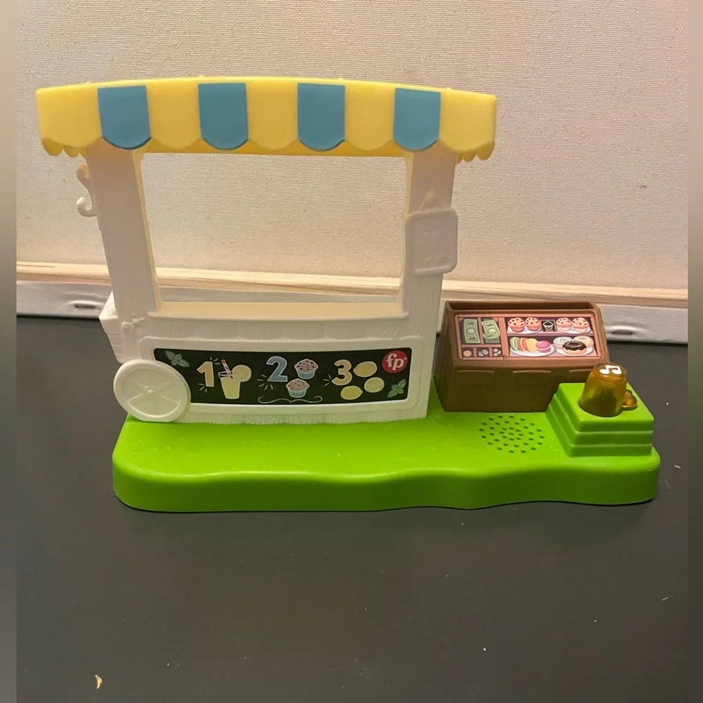 Figurine Play food Stand with Green Base lights up when you push button talks